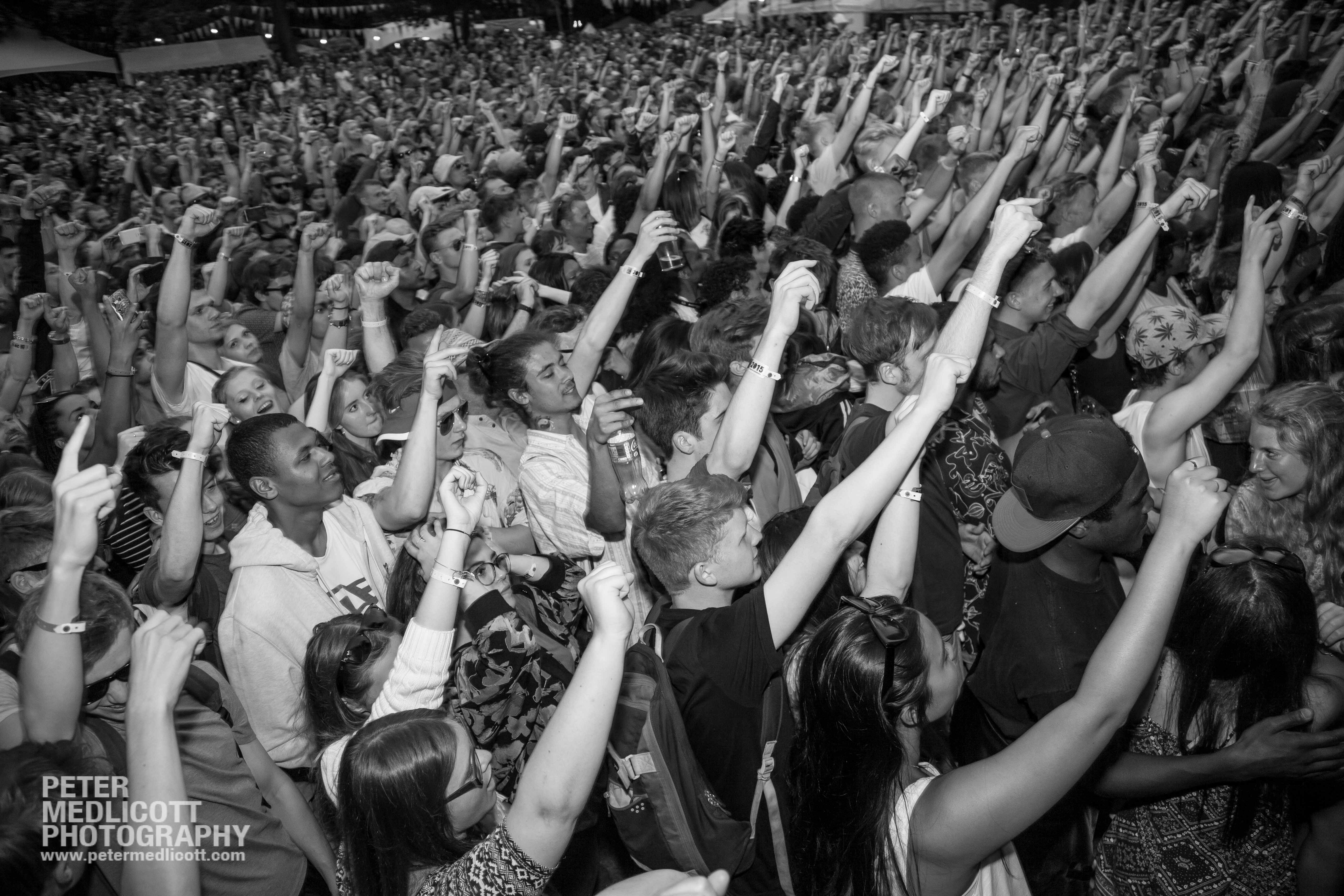 Crowd at Music Festival Public Enemy Fight the Power Birmingham Mostly Jazz Festival by Birmingham based photographer Peter Medlicott Editorial photography Birmingham uk